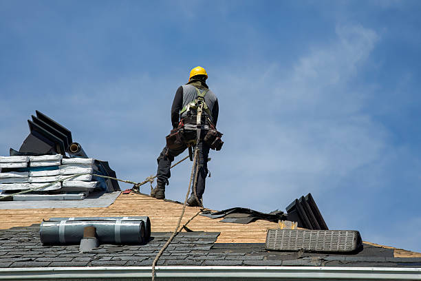 Professional Roof Replacement technician working in Blue Point, NY